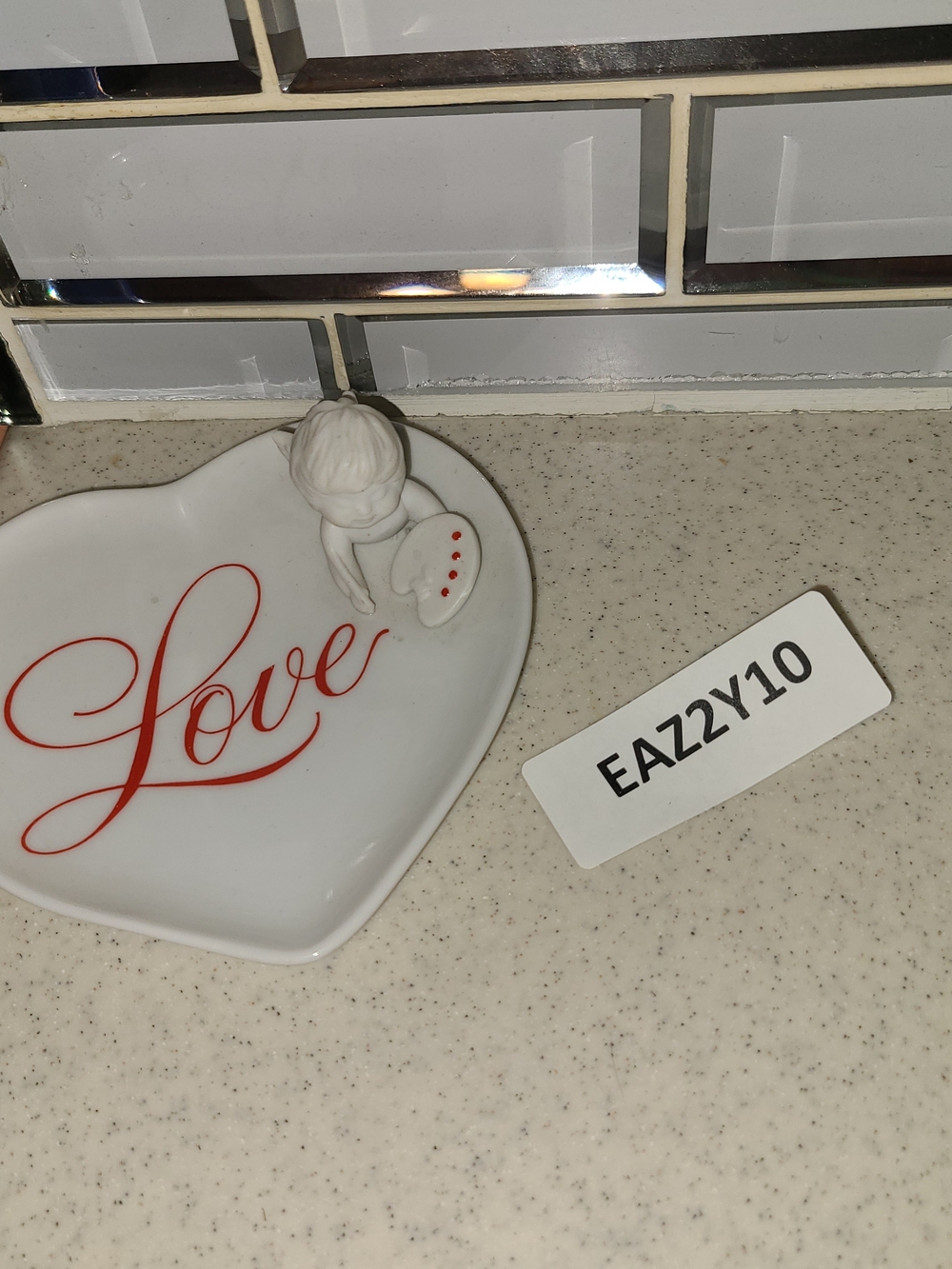 Vintage white heart dish with red 'Love' script and angel figure